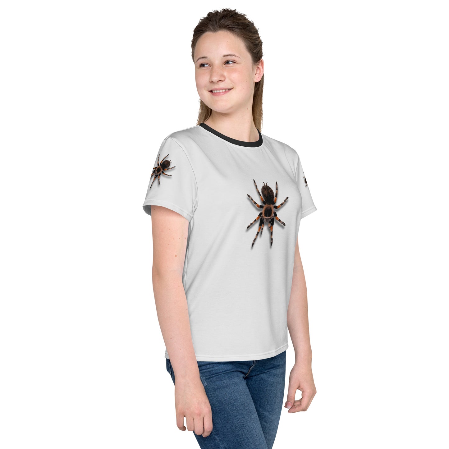 Teenage girl wearing a 3D Tarantula spider T-shirt, front right view