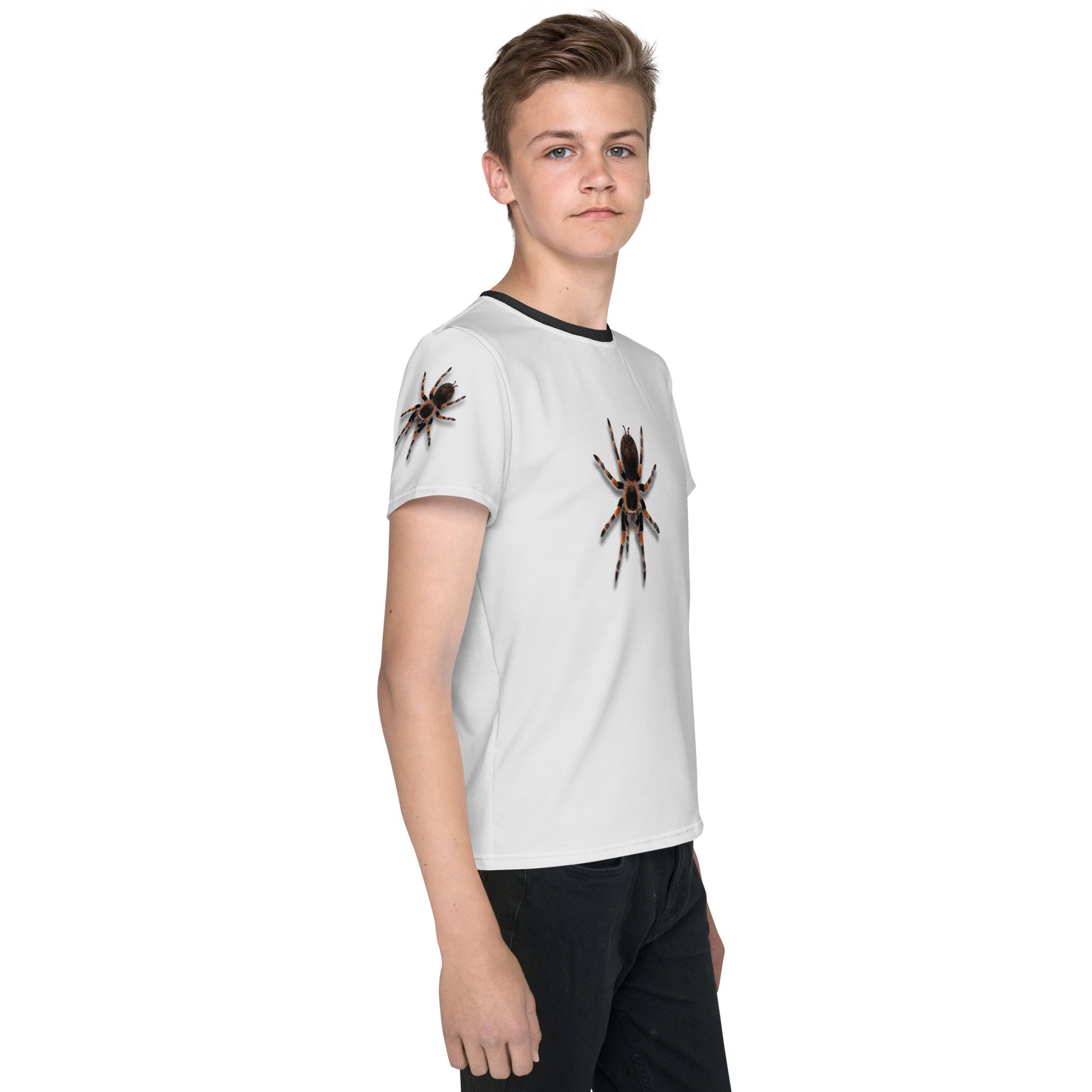 Teenage boy wearing a 3D Tarantula spider T-shirt, front right view