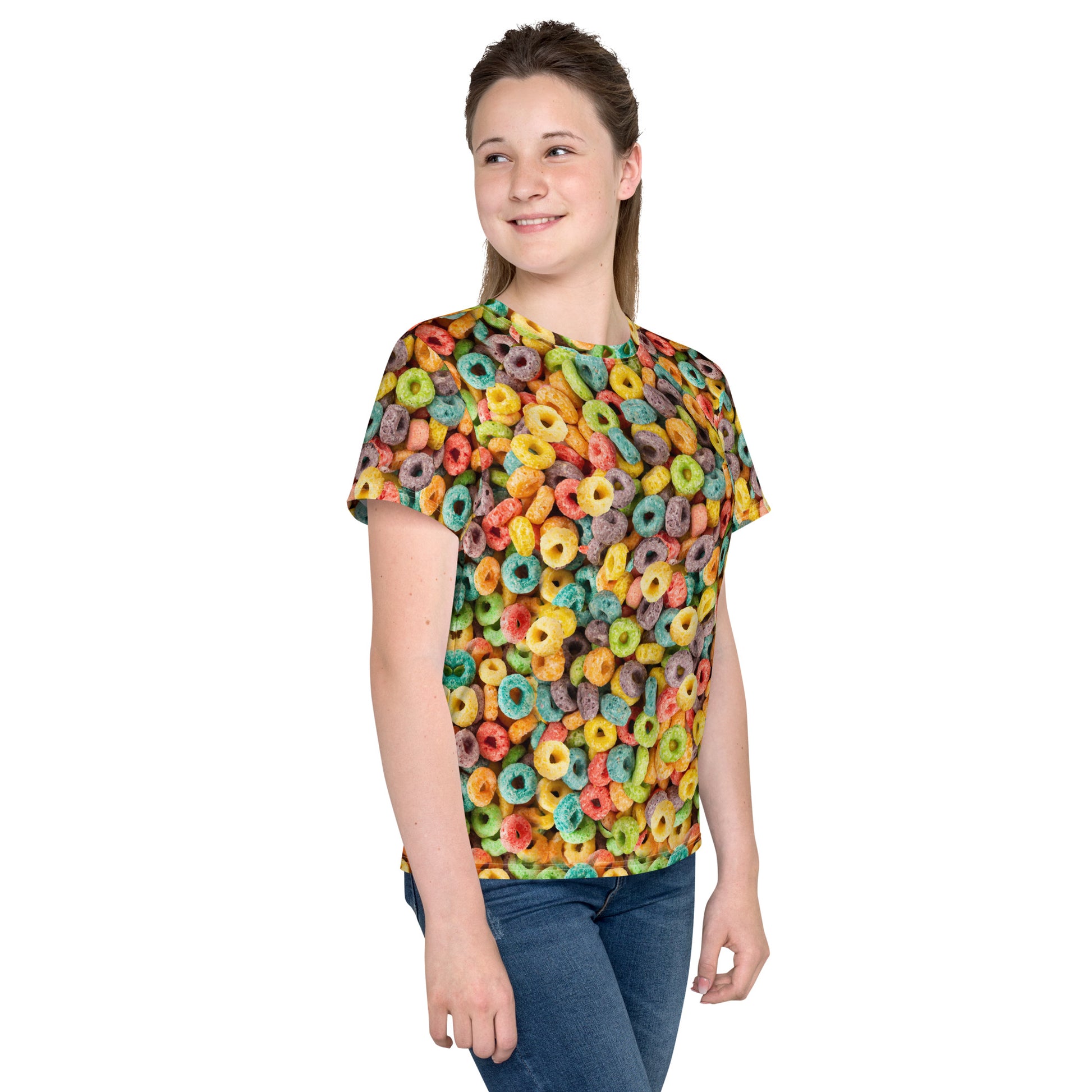 Teenage girl wearing fruity cereal hoops all over print T-shirt front right