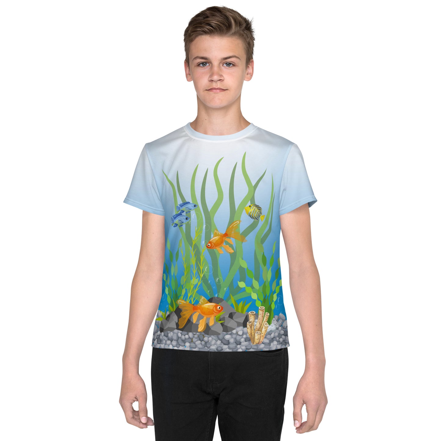 Teenage boy wearing an all over print tropical fish aquarium scene T-shirt, facing forwards.