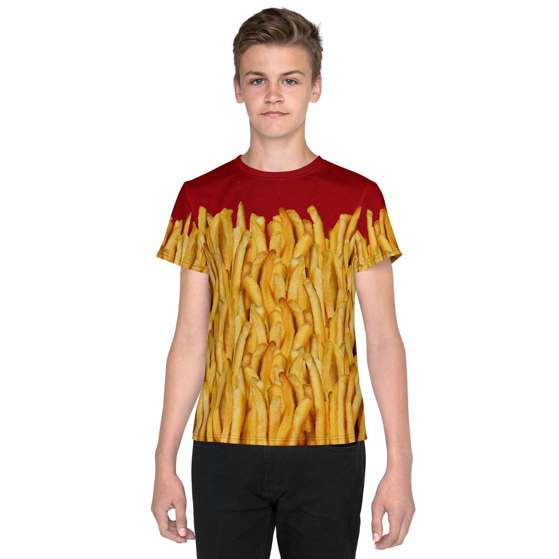 Teenage boy wearing a french fries and ketchup all over print T-shirt, facing forward