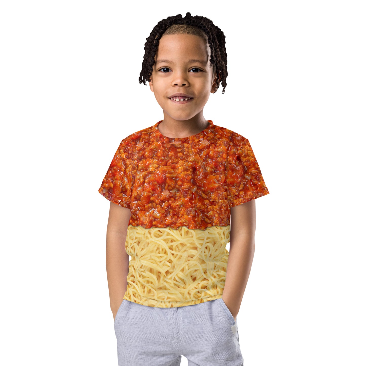 Little boy wearing a kid's spaghetti bolognese all over print T-shirt, front view.