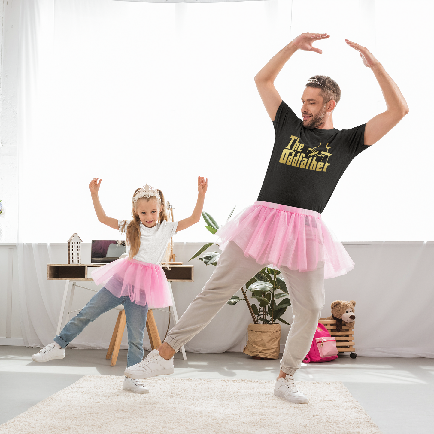 Young Father ballet dancing with his little girl wearing the OddFather T-shirt