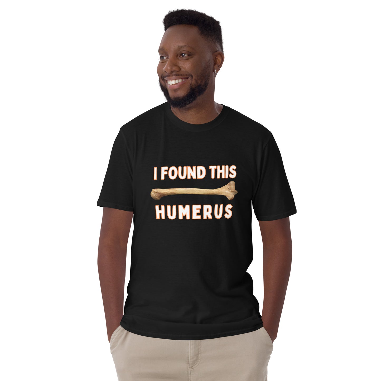 male model wearing a Funny T-shirt that has a arm bone on it and reads 'I found this humerus'