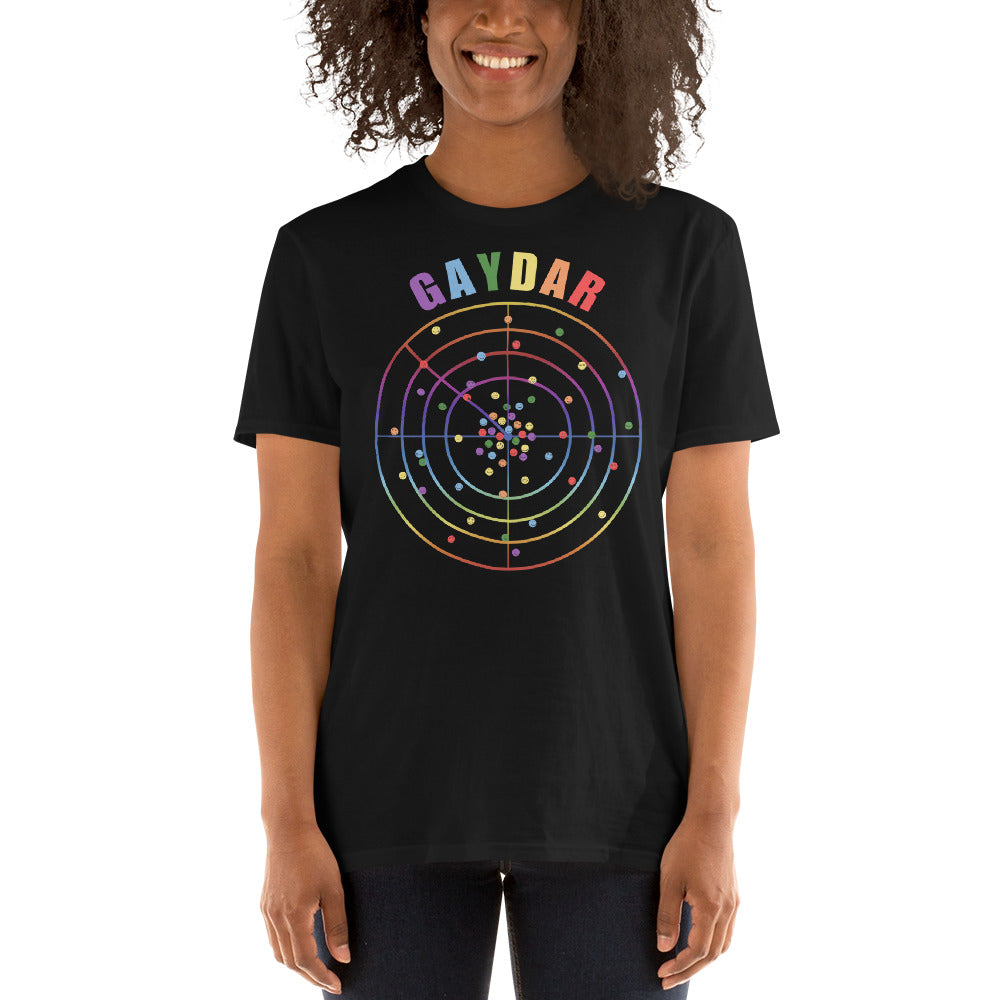 happy woman wearing a Black LGBTQ T-shirt with GAYDAR in pride colours and a graphic of a radar with lots of colourful dots on it with happy faces.