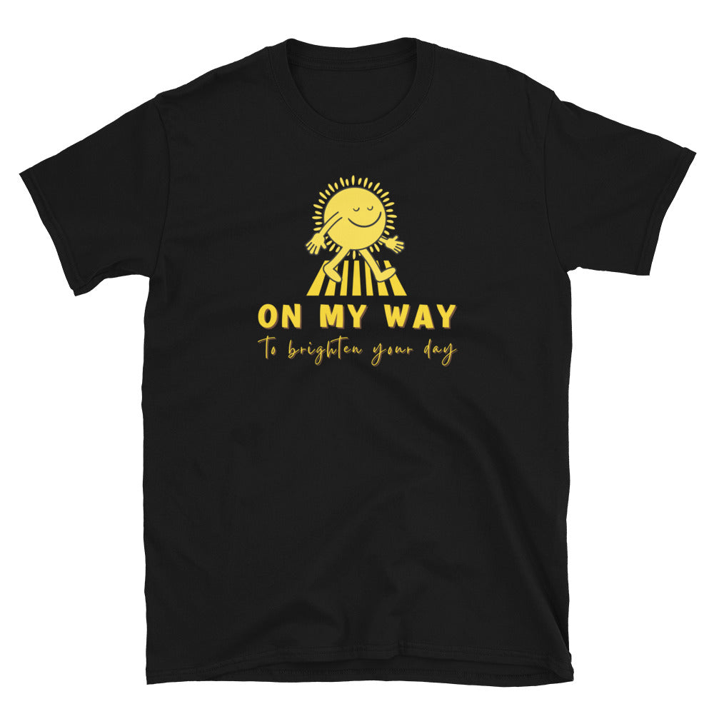 Black T shirt with a walking sun that reads On My Way To Brighten Your Day