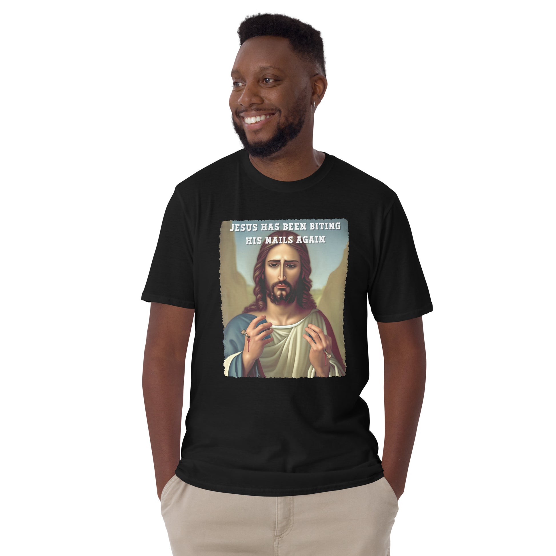 male model wearing a Jesus has been biting his nails again offensive Jesus T-shirt in black