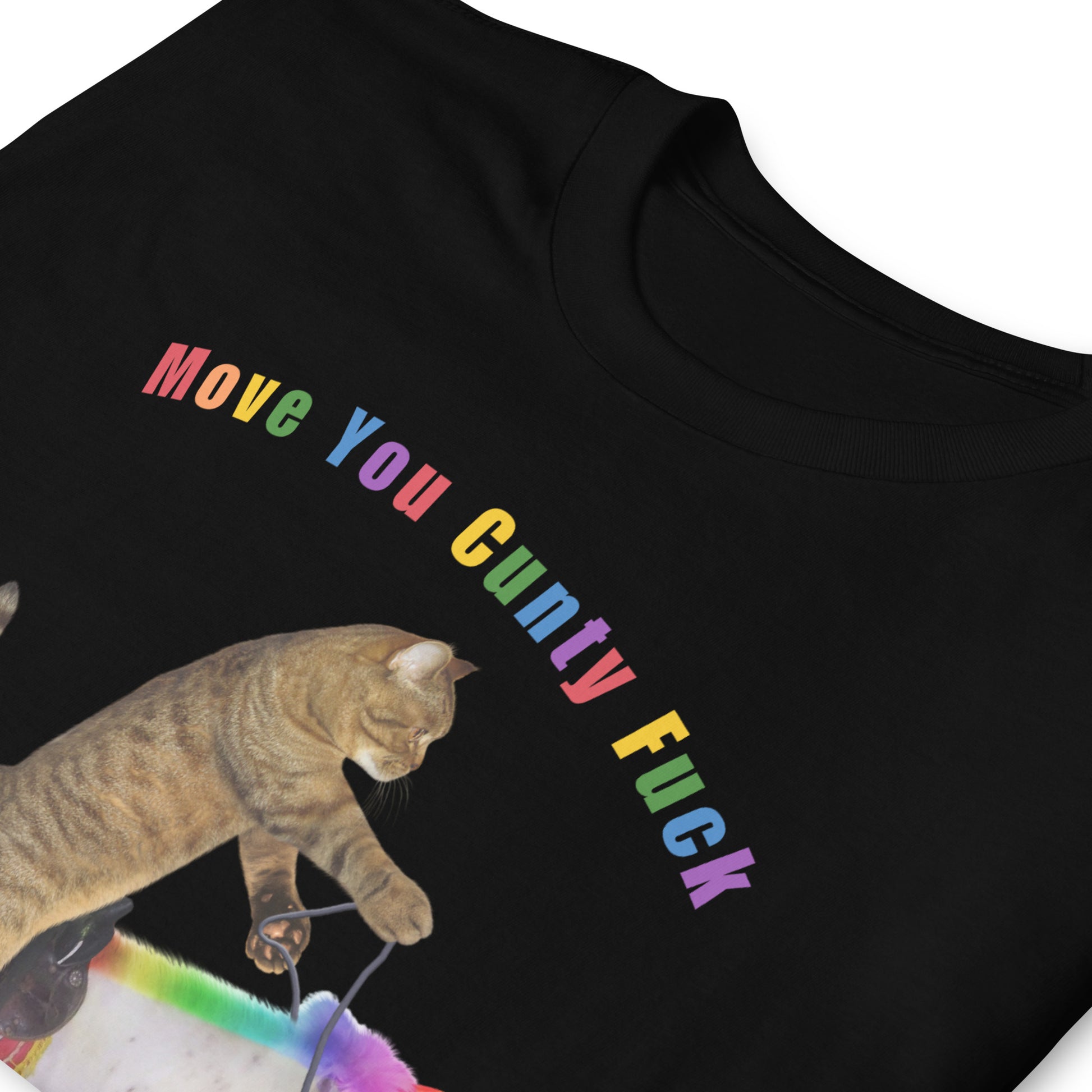 folded Offensive cat riding a rainbow Unicorn T shirt which reads Move you Cunty F*ck, black