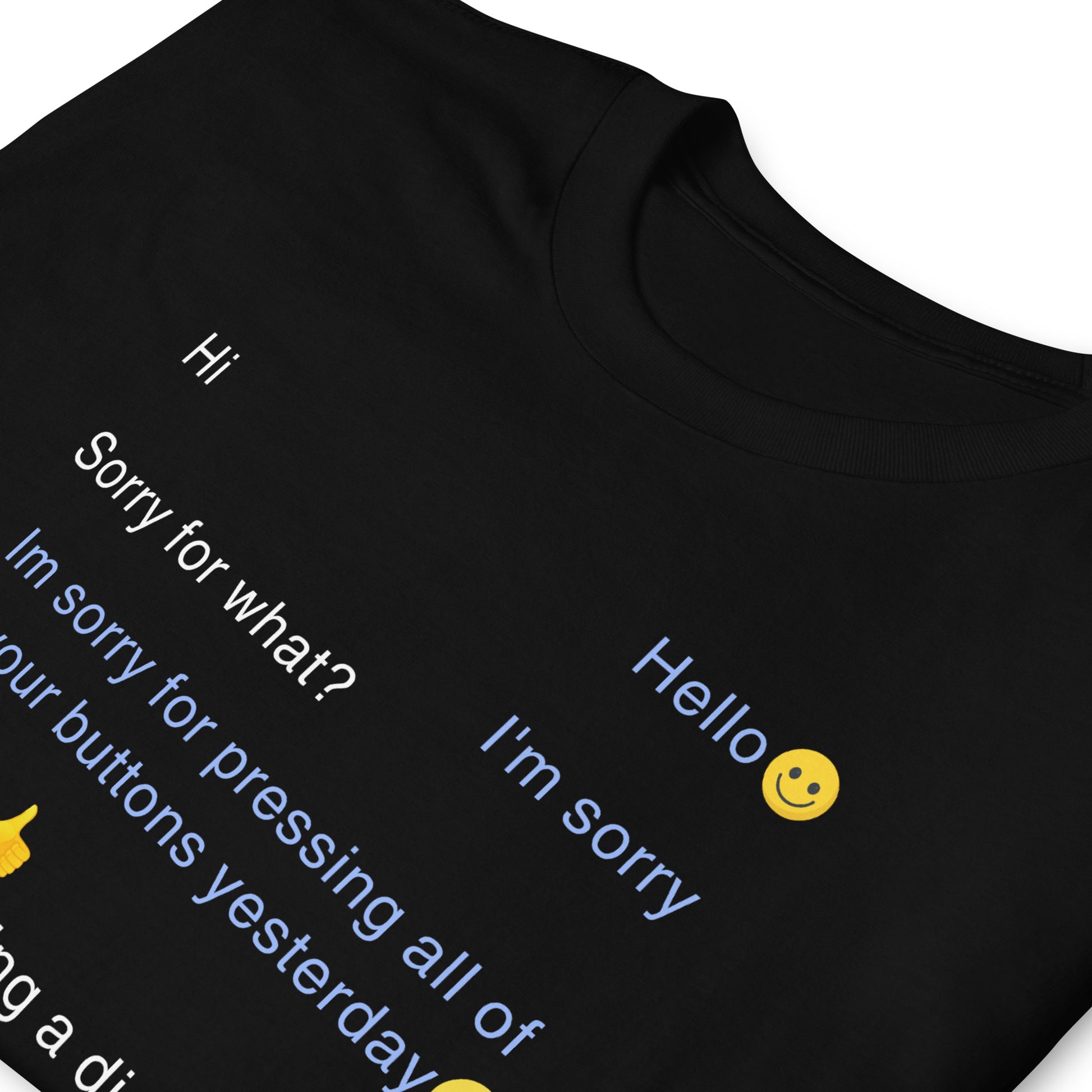 folded black funny t-shirt with sarcastic text in form of a text message that says Sorry for pressing all of your buttons yesterday, I was looking for mute.