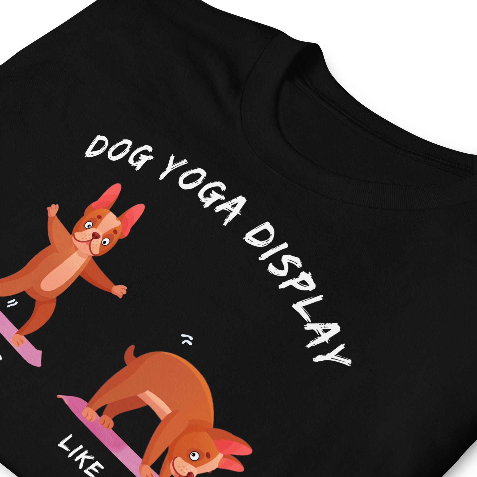 folded black funny t-shirt with dog making yoga poses who then runs off when he sees a squirrel