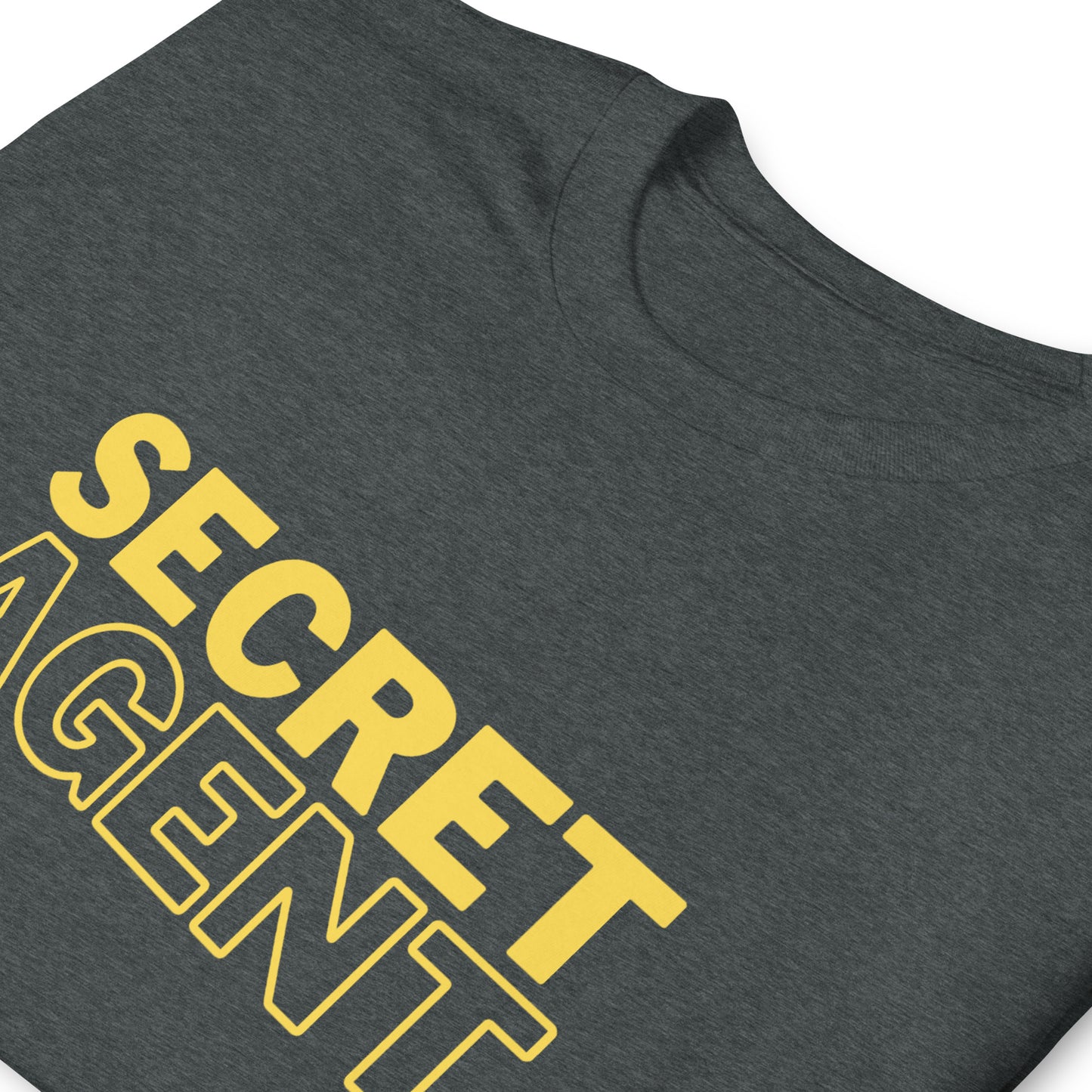 Dark Heather Grey unisex T-shirt that reads SECRET AGENT in yellow text, folded