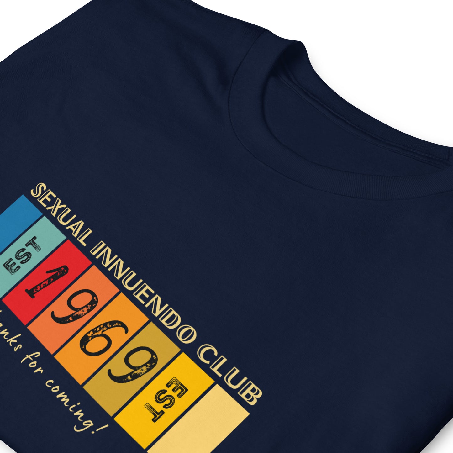 Funny retro T-shirt that reads Sexual Innuendo Club, EST 1969, Thanks for coming! Folded, Navy.