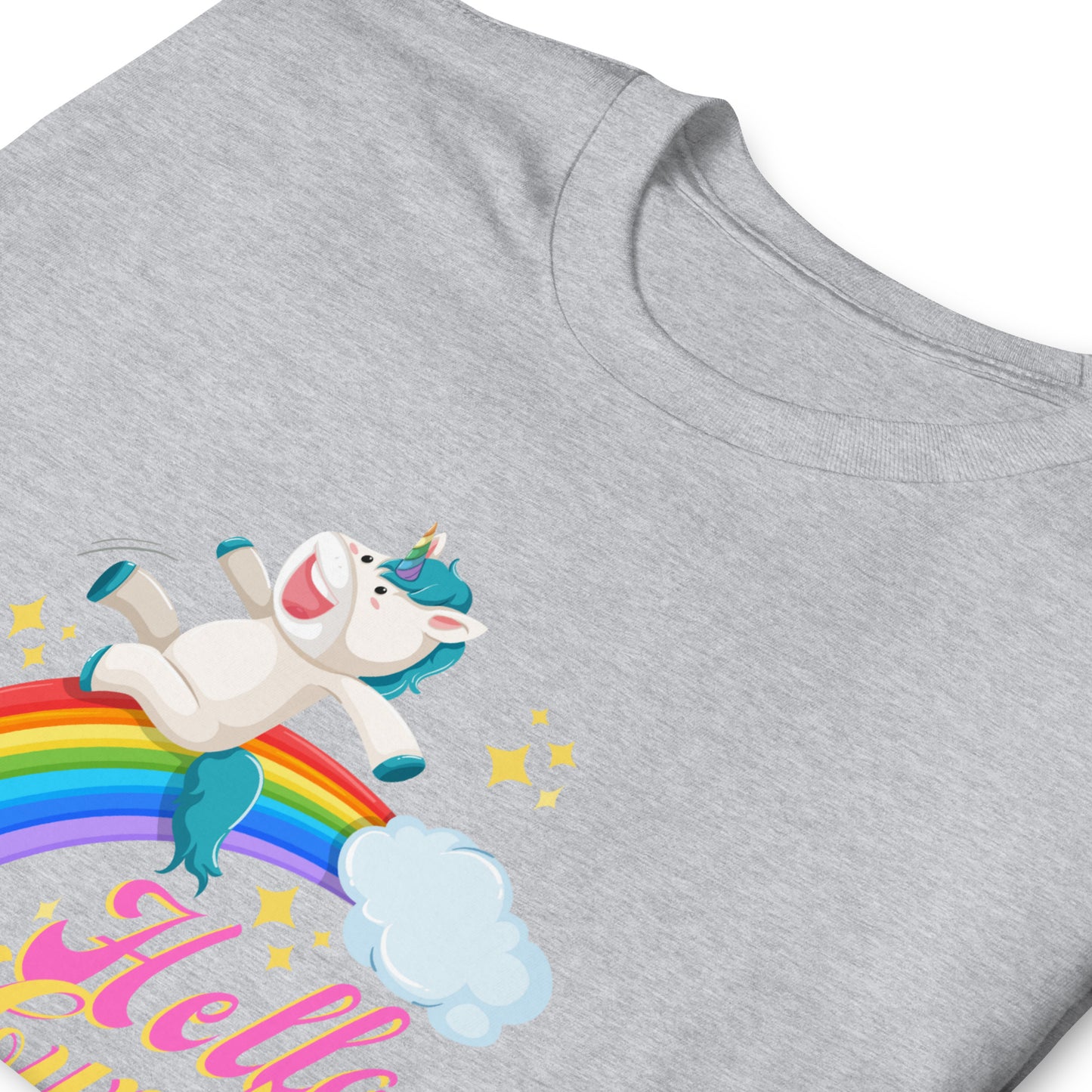 Possibly offensive T-shirt that has a unicorn sliding down a rainbow on it with text that reads Hello Cunty, sport grey, folded.