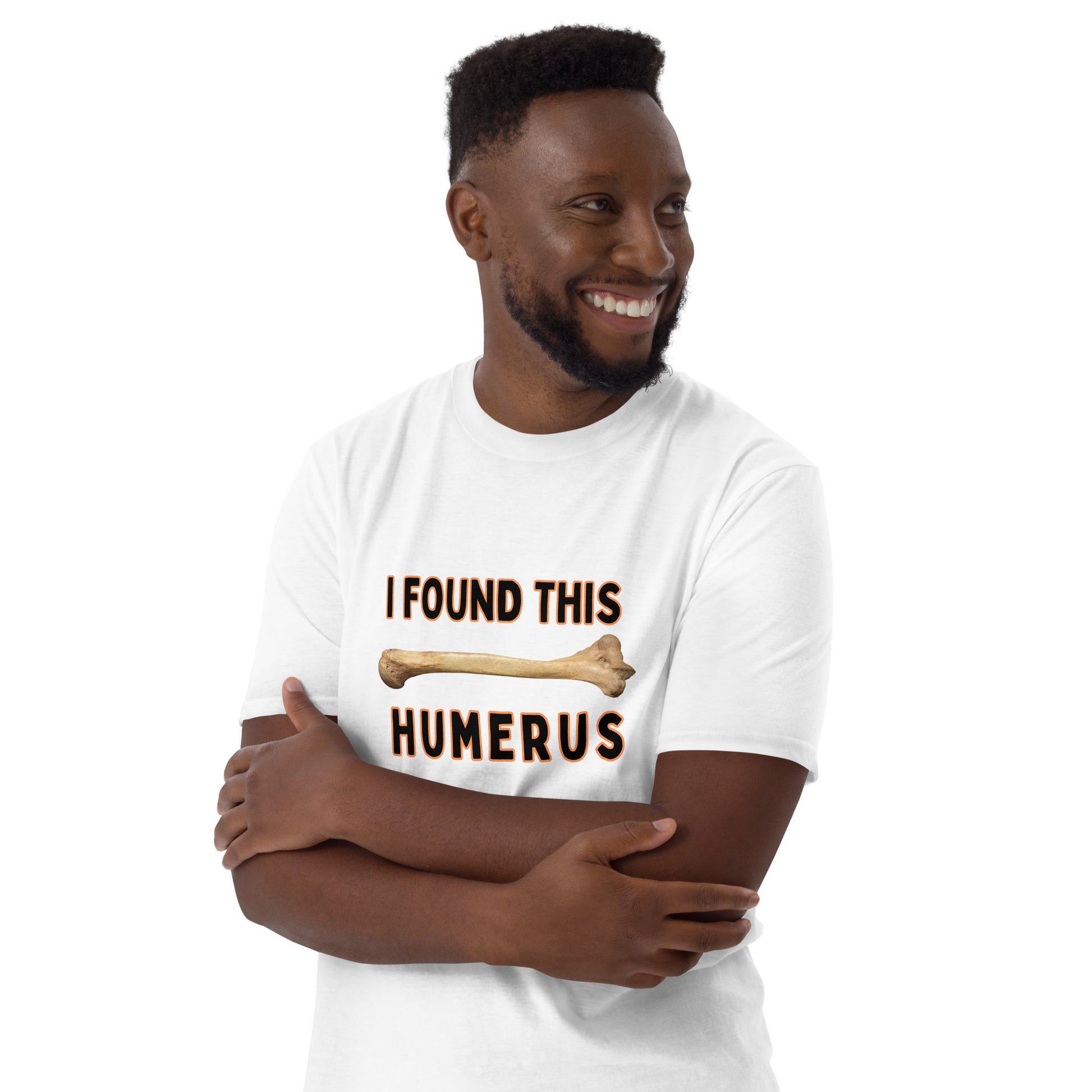 male model wearing a white Funny T-shirt that has a arm bone on it and reads 'I found this humerus' with black lettering