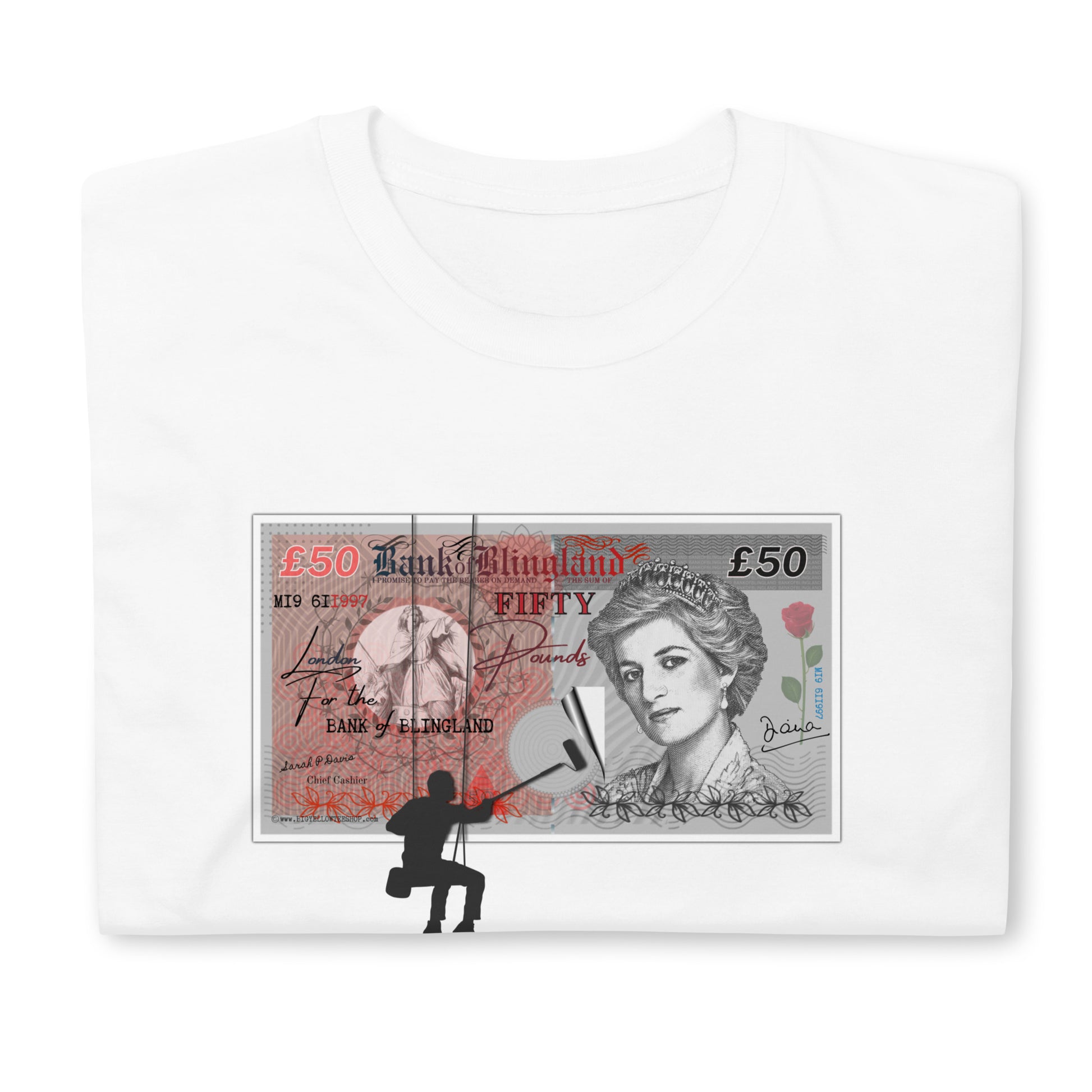 White folded T-shirt featuring a spoof £50 note with Princess Diana on it, the money is being posted to a wall by a silhouetted man.