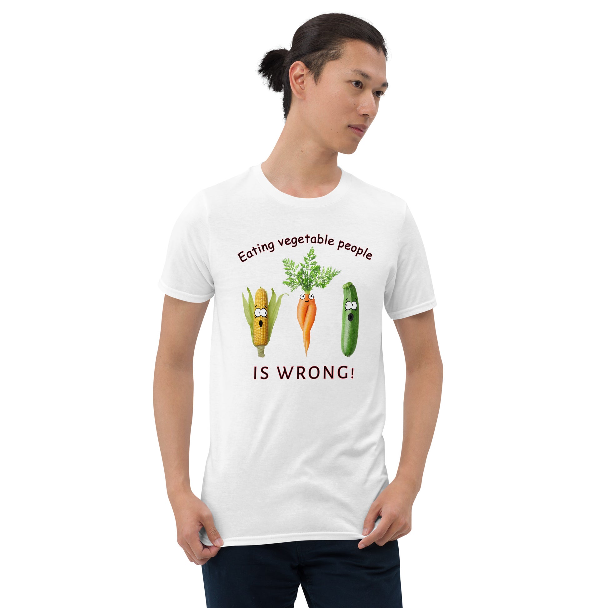 young man wearing a Eating Vegetable People is Wrong! T-shirt with humanised vegetables.