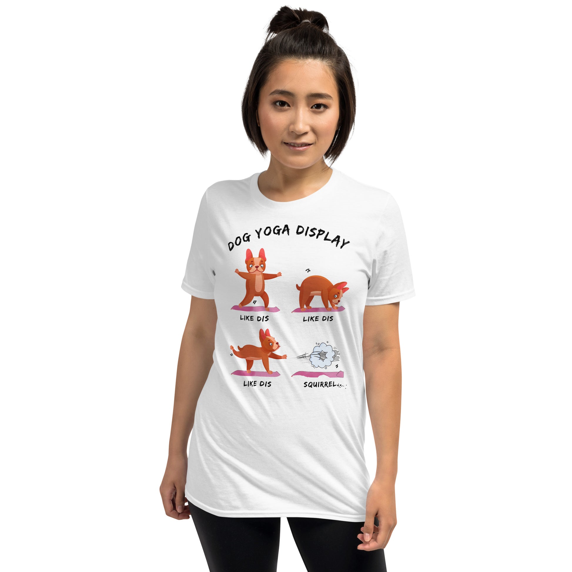 woman wearing a white DOG YOGA funny t-shirt with dog making yoga poses who then runs off when he sees a squirrel