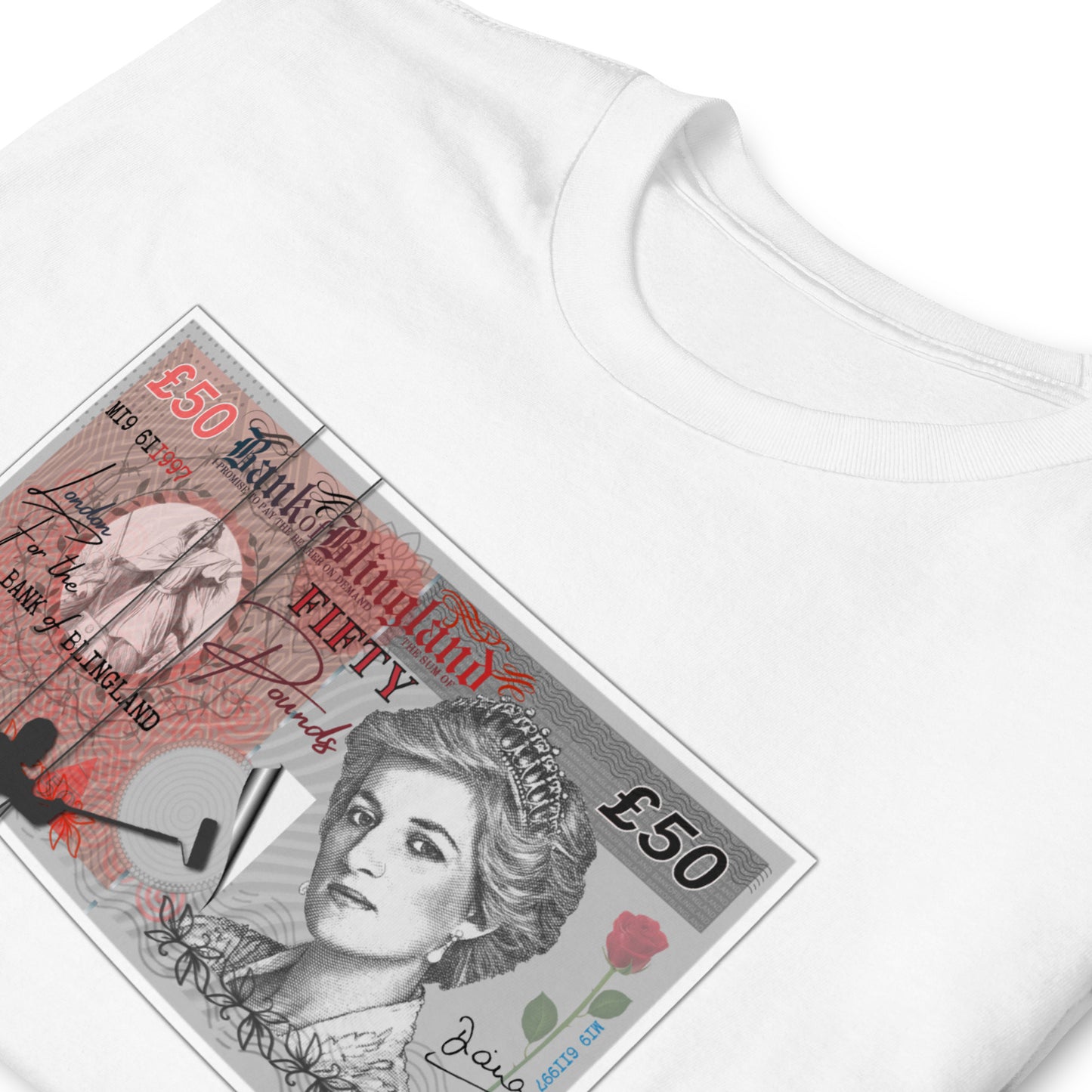 White folded T-shirt featuring a spoof £50 note with Princess Diana on it, the money is being posted to a wall by a silhouetted man.