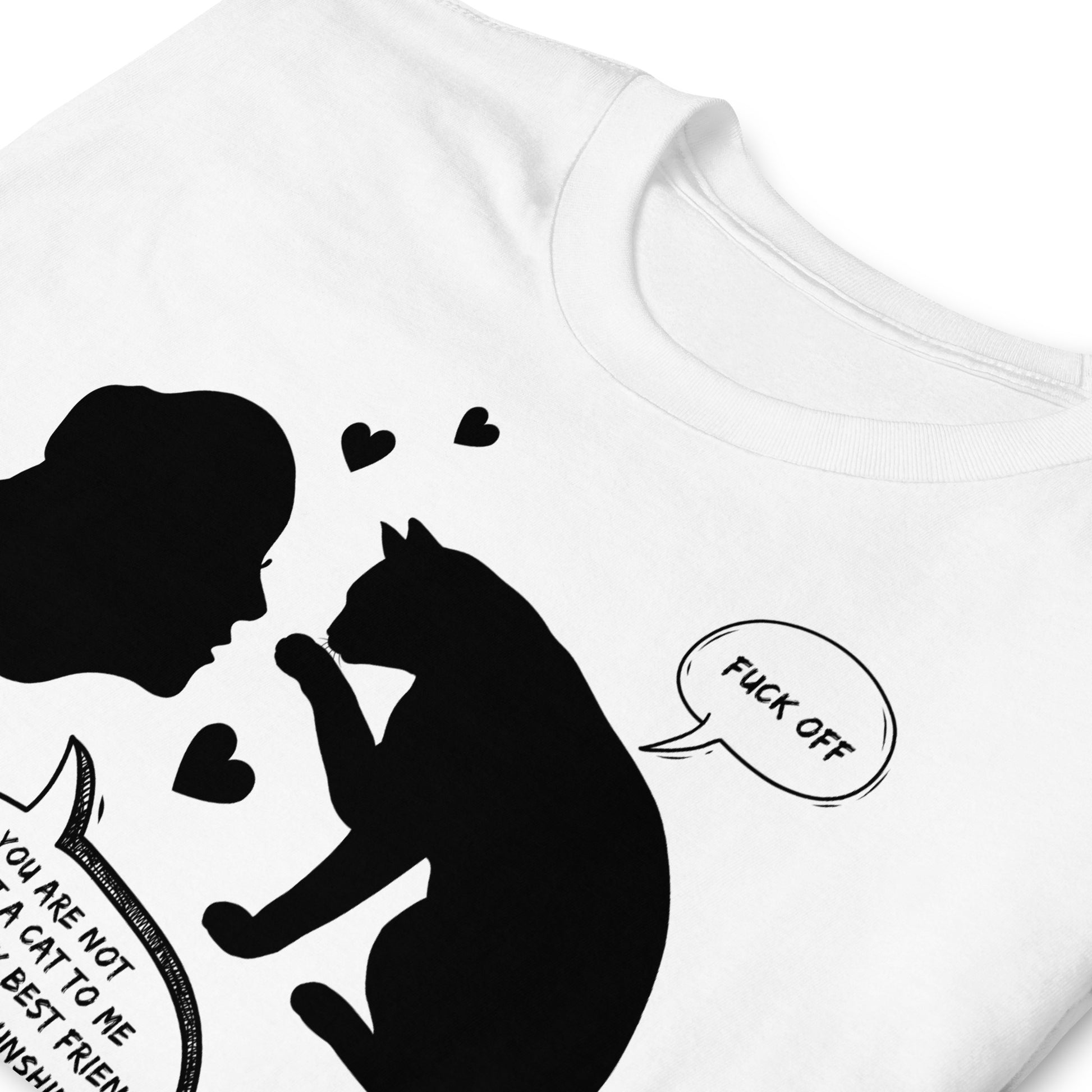 folded white Rude cat T-shirt with loving woman adoring her cat but the cat is saying Fuck Off